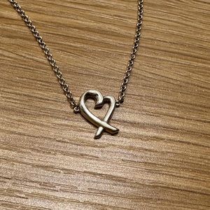 Tiffany &Co. Paloma Picasso loving heart bracelet